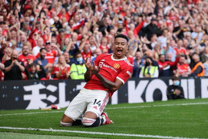MANCHESTER, ENGLAND - SEPTEMBER 11: Jesse Lingard of Manchester United celebrates after scoring their sides fourth goal during the Premier League match between Manchester United and Newcastle United at Old Trafford on September 11, 2021 in Manchester, England. (Photo by Clive Brunskill/Getty Images)