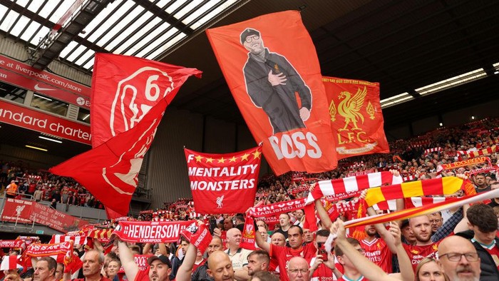 LIVERPOOL, ENGLAND - SEPTEMBER 18: Liverpool fans show their support prior to the Premier League match between Liverpool and Crystal Palace at Anfield on September 18, 2021 in Liverpool, England. (Photo by Clive Brunskill/Getty Images)