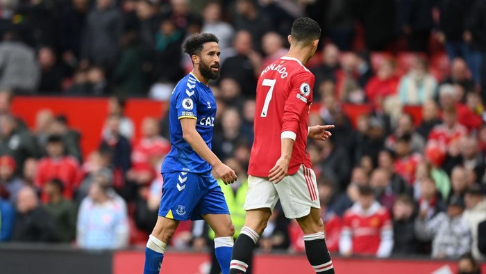 MANCHESTER, ENGLAND - OCTOBER 02: Andros Townsend of Everton interacts with Cristiano Ronaldo of Manchester United following the Premier League match between Manchester United and Everton at Old Trafford on October 02, 2021 in Manchester, England. (Photo by Michael Regan/Getty Images)