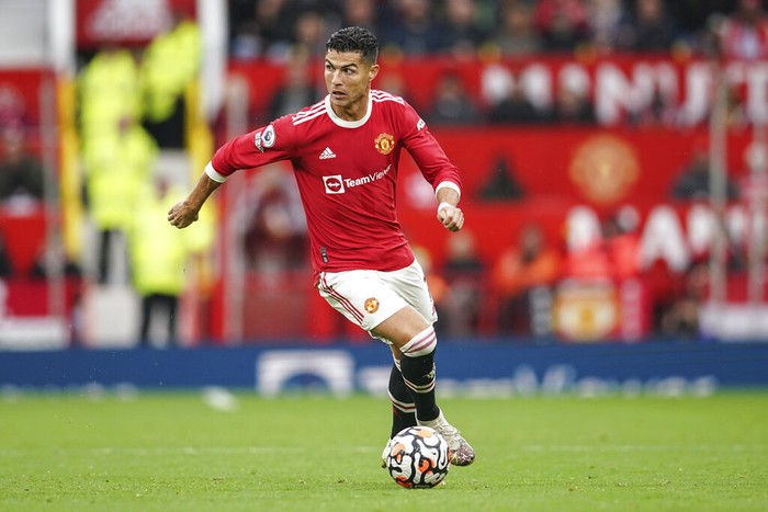 Manchester United's Cristiano Ronaldo controls the ball during the English Premier League soccer match between Manchester United and Everton, at Old Trafford, Manchester, England, Saturday, Oct. 2, 2021. (AP Photo/Dave Thompson)