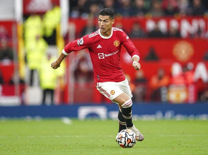 Manchester United's Cristiano Ronaldo controls the ball during the English Premier League soccer match between Manchester United and Everton, at Old Trafford, Manchester, England, Saturday, Oct. 2, 2021. (AP Photo/Dave Thompson)