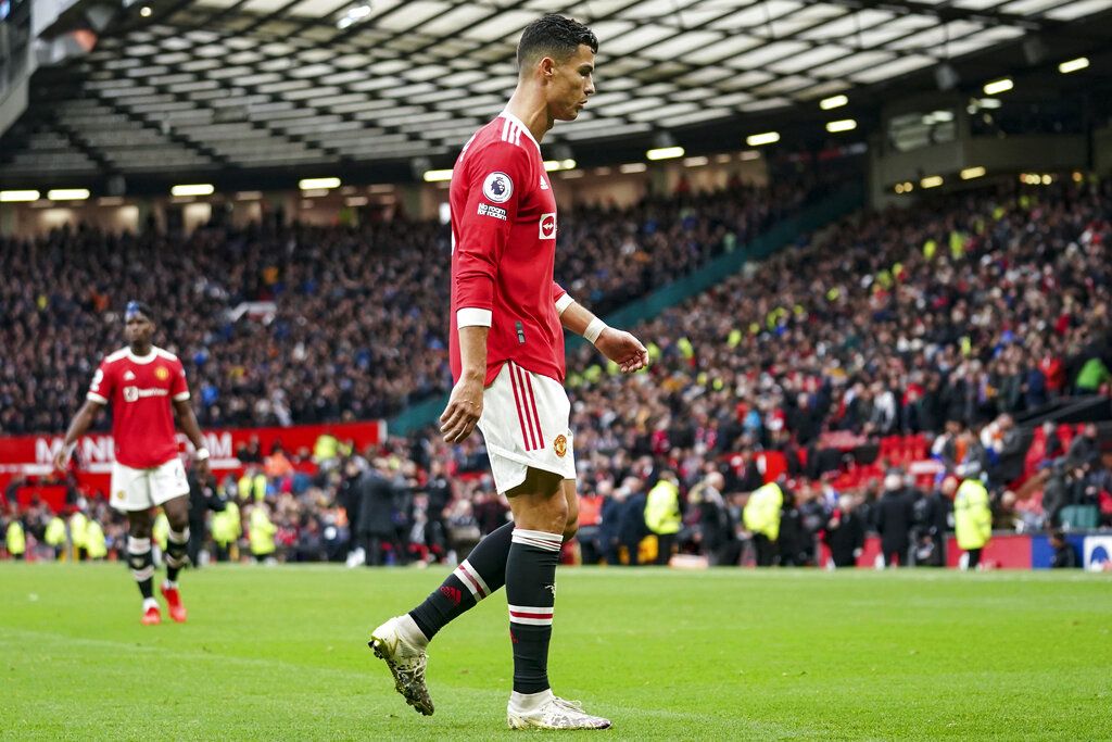 Manchester United's Cristiano Ronaldo walks off the pitch at the end of the English Premier League soccer match between Manchester United and Everton, at Old Trafford, Manchester, England, Saturday, Oct. 2, 2021. The match ended in a 1-1 draw. (AP Photo/Dave Thompson)