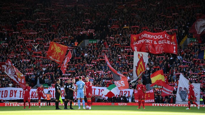 LIVERPOOL, ENGLAND - OCTOBER 03: Liverpool fans show their support prior to the Premier League match between Liverpool and Manchester City at Anfield on October 03, 2021 in Liverpool, England. (Photo by Michael Regan/Getty Images)