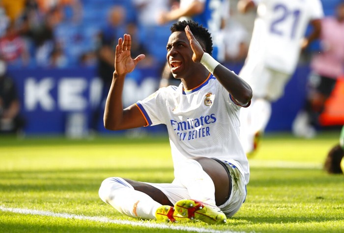 Real Madrid Real Madrid's Vinicius Junior reacts during a Spanish La Liga soccer match between RCD Espanyol and Real Madrid at the Cornella-El Prat stadium in Barcelona, Spain, Sunday, Oct. 3, 2021. (AP Photo/Joan Monfort)