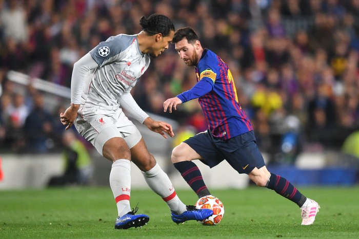 BARCELONA, SPAIN - MAY 01: Virgil van Dijk of Liverpool and Lionel Messi of Barcelona in action during the UEFA Champions League Semi Final first leg match between Barcelona and Liverpool at the Nou Camp on May 01, 2019 in Barcelona, Spain. (Photo by Michael Regan/Getty Images)