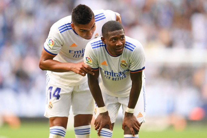 BARCELONA, SPAIN - OCTOBER 03: David Alaba and Casemiro of Real Madrid CF look on during the La Liga Santander match between RCD Espanyol and Real Madrid CF at RCDE Stadium on October 03, 2021 in Barcelona, Spain. (Photo by David Ramos/Getty Images)