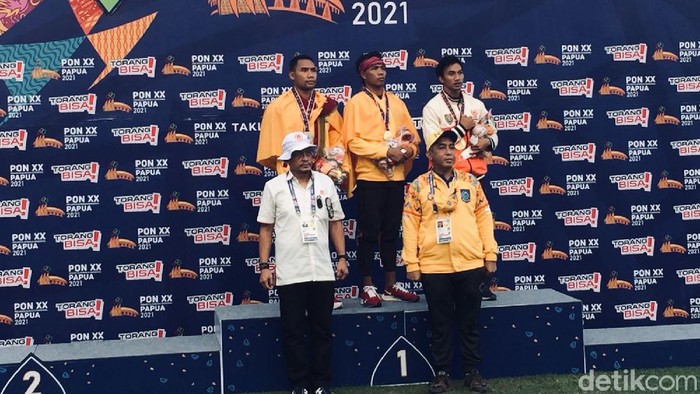 Lalu Zohri Segel Emas Lari 100 M PON Papua Foto: (Femi Diah/detikSport)