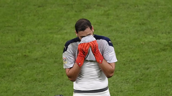 Italys goalkeeper Gianluigi Donnarumma reacts at the end of the UEFA Nations League semifinal soccer match between Italy and Spain at the San Siro stadium, in Milan, Italy, Wednesday, Oct. 6, 2021. Spain won the match 1-2. (Marco Bertorello/Pool via AP)
