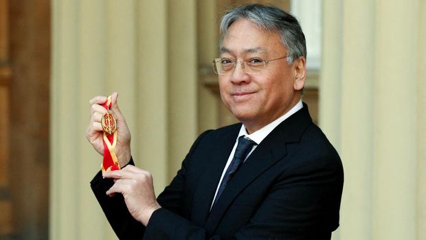 Kazuo Ishiguro British author Kazuo Ishiguro poses with his medal poses with his medal after being appointed as a Knights Bachelor (Knighthood) for services to literature following an investiture ceremony at Buckingham Palace in London on February 7, 2019. (Photo by Jonathan Brady / POOL / AFP)