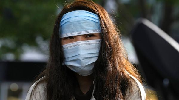 Perlindungan Ganda Warga China Saking Kapoknya Dihantam Corona