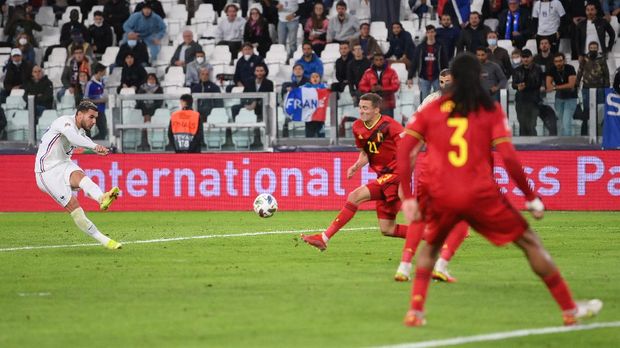 TURIN, ITALY - OCTOBER 07: Theo Hernandez of France scores their side's third goal during the UEFA Nations League 2021 Semi-final match between Belgium and France at Juventus Stadium on October 07, 2021 in Turin, Italy. (Photo by Laurence Griffiths/Getty Images)