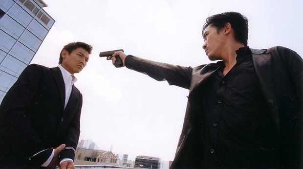 Andy Lau dan Tony Leung dalam Infernal Affairs.