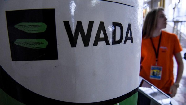 The World Anti-Doping Agency or WADA logo is pictured at the Russkaya Zima (Russian Winter) Athletics competition in Moscow on February 9, 2020. - The entire board of Russias athletics federation has resigned as the government attempts to find a way out of the countrys deepening doping crisis before this years Olympic Games. (Photo by Kirill KUDRYAVTSEV / AFP)