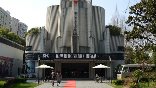 People at the Art Deco New hengshan Cinema, built in 1951 in the Old French Concession, Shanghai, China.