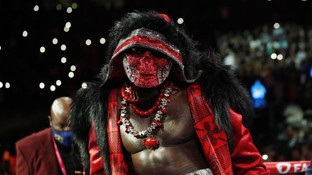 Boxing - Tyson Fury v Deontay Wilder - WBC Heavyweight Title - T-Mobile Arena, Las Vegas, Nevada, U.S. - October 9, 2021 Deontay Wilder makes his entrance before the fight REUTERS/Steve Marcus