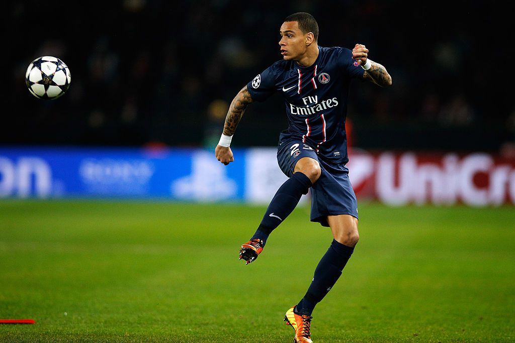 PARIS, FRANCE - MARCH 06:  Gregory Van Der Wiel of PSG in action during the Round of 16 UEFA Champions League match between Paris St Germain and Valencia CF at Parc des Princes on March 6, 2013 in Paris, France.  (Photo by Dean Mouhtaropoulos/Getty Images)