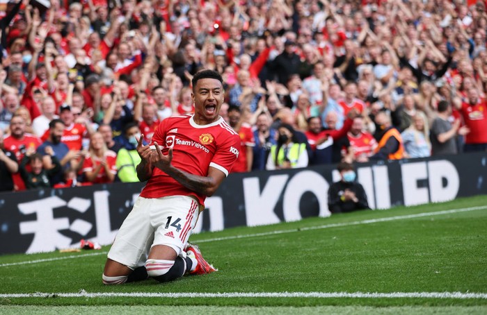 MANCHESTER, ENGLAND - SEPTEMBER 11: Jesse Lingard of Manchester United celebrates after scoring their sides fourth goal during the Premier League match between Manchester United and Newcastle United at Old Trafford on September 11, 2021 in Manchester, England. (Photo by Clive Brunskill/Getty Images)
