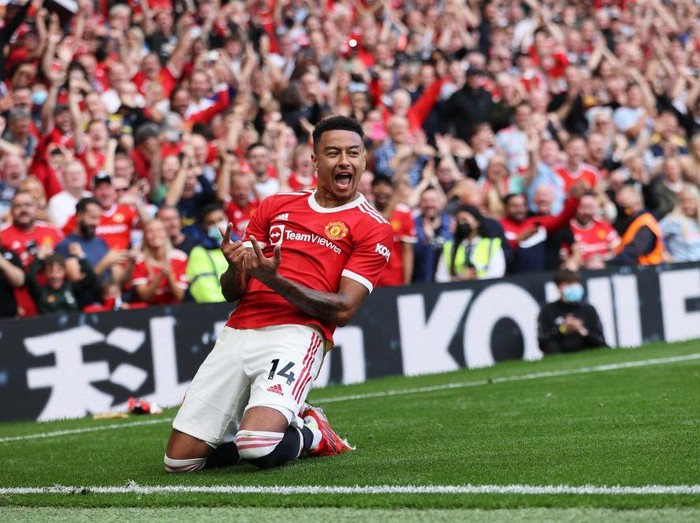 MANCHESTER, ENGLAND - SEPTEMBER 11: Jesse Lingard of Manchester United celebrates after scoring their side's fourth goal during the Premier League match between Manchester United and Newcastle United at Old Trafford on September 11, 2021 in Manchester, England. (Photo by Clive Brunskill/Getty Images)