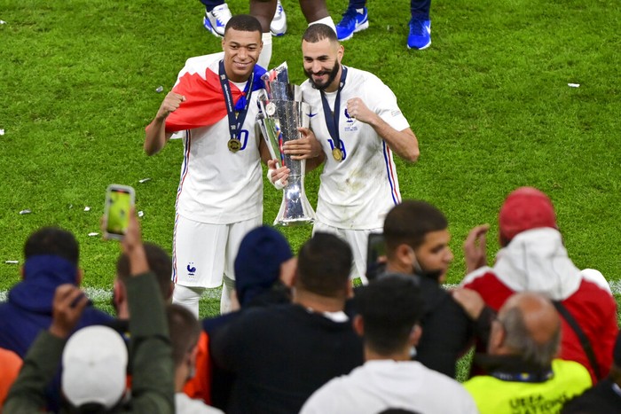 Karim Benzema France's Karim Benzema celebrates at the end of the UEFA Nations League final soccer match between France and Spain at the San Siro stadium, in Milan, Italy, Sunday, Oct. 10, 2021. (AP Photo/Luca Bruno)