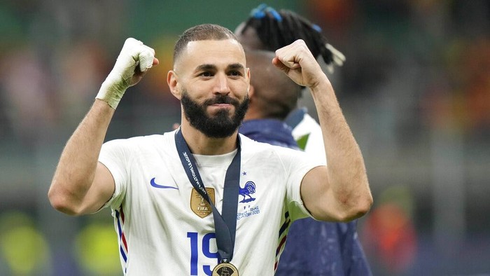 Frances Karim Benzema celebrates at the end of the UEFA Nations League final soccer match between France and Spain at the San Siro stadium, in Milan, Italy, Sunday, Oct. 10, 2021. (AP Photo/Luca Bruno)