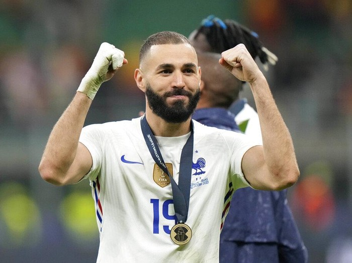France's Karim Benzema celebrates at the end of the UEFA Nations League final soccer match between France and Spain at the San Siro stadium, in Milan, Italy, Sunday, Oct. 10, 2021. (AP Photo/Luca Bruno)