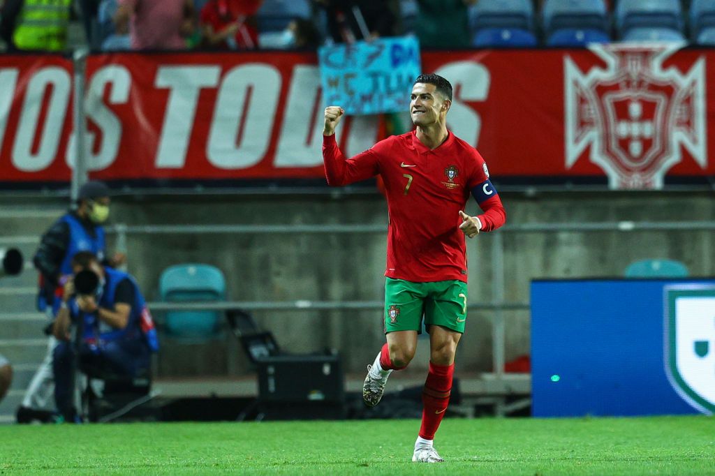 FARO, PORTUGAL - OCTOBER 12: Cristiano Ronaldo of Manchester United and Portugal celebrates scoring Portugal first goal during the 2022 FIFA World Cup Qualifier match between Portugal and Luxembourg at Estadio Algarve on October 12, 2021 in Faro, Faro. (Photo by Carlos Rodrigues/Getty Images)