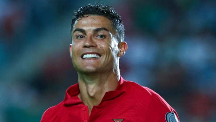 FARO, PORTUGAL - OCTOBER 12: Cristiano Ronaldo of Manchester United and Portugal celebrates scoring Portugals fifth goal and his third in the match during the 2022 FIFA World Cup Qualifier match between Portugal and Luxembourg at Estadio Algarve on October 12, 2021 in Faro, Faro. (Photo by Carlos Rodrigues/Getty Images)