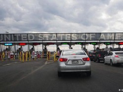 AS Bersiap Cabut Pembatasan Perjalanan Darat-Udara-Laut pada November