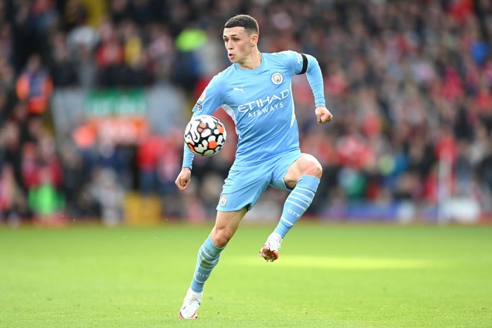 LIVERPOOL, ENGLAND - OCTOBER 03: Phil Foden of Manchester City on the ball during the Premier League match between Liverpool and Manchester City at Anfield on October 03, 2021 in Liverpool, England. (Photo by Michael Regan/Getty Images)