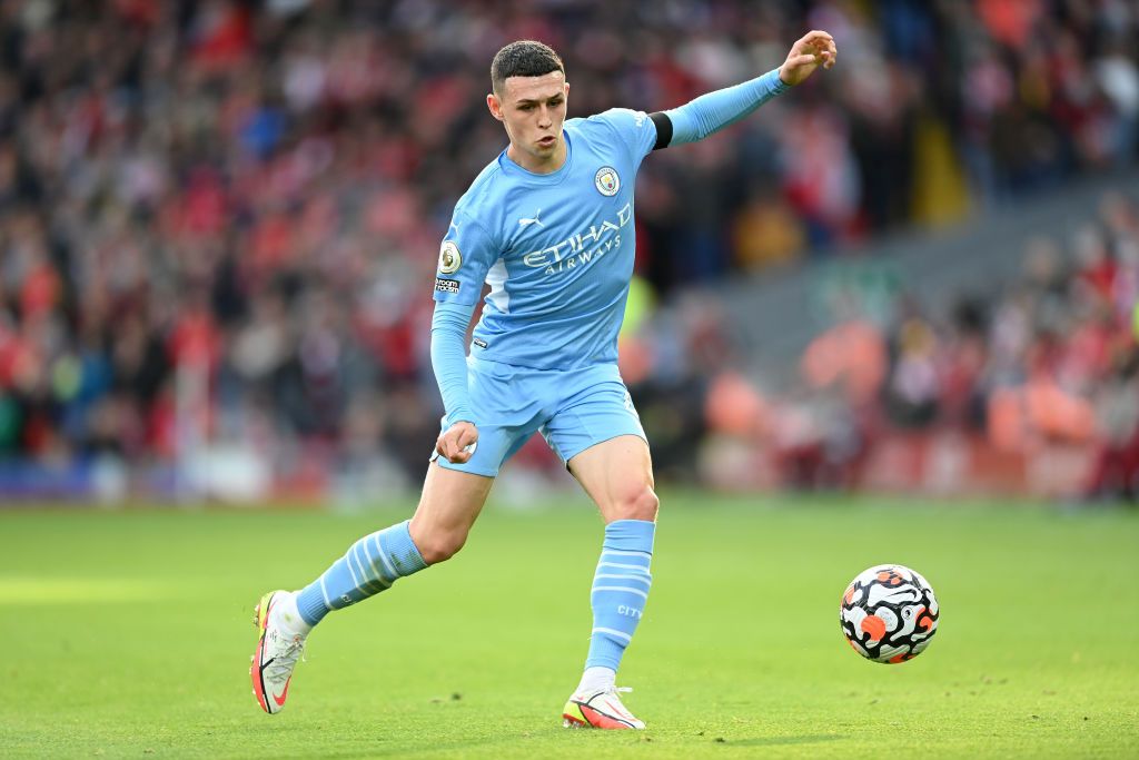 LIVERPOOL, ENGLAND - OCTOBER 03: Phil Foden of Manchester City on the ball during the Premier League match between Liverpool and Manchester City at Anfield on October 03, 2021 in Liverpool, England. (Photo by Michael Regan/Getty Images)