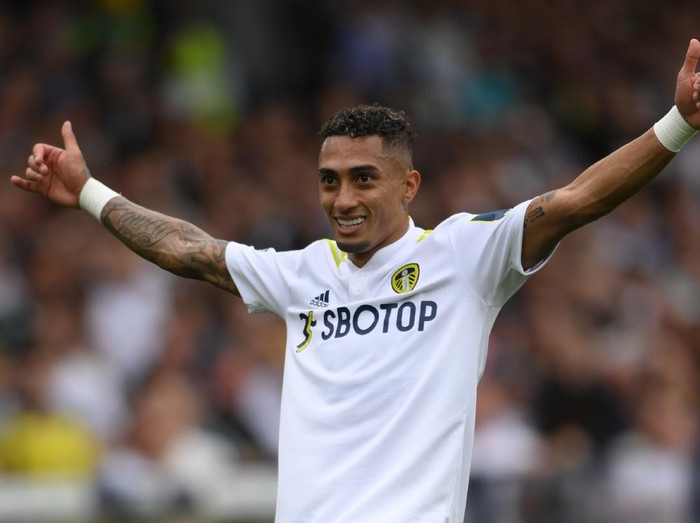 LEEDS, ENGLAND - SEPTEMBER 25: Leeds United player Raphinha celebrates his goal during the Premier League match between Leeds United and West Ham United at Elland Road on September 25, 2021 in Leeds, England. (Photo by Stu Forster/Getty Images)