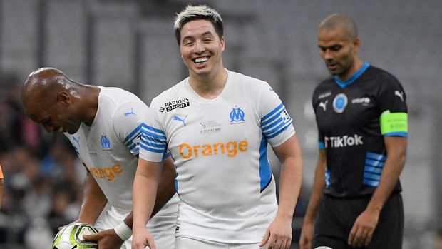 French former player Samir Nasri reacts during the charity 