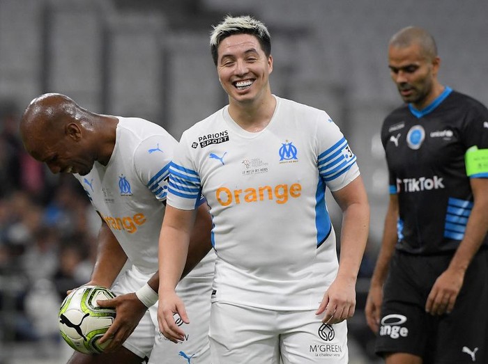 French former player Samir Nasri reacts during the charity 