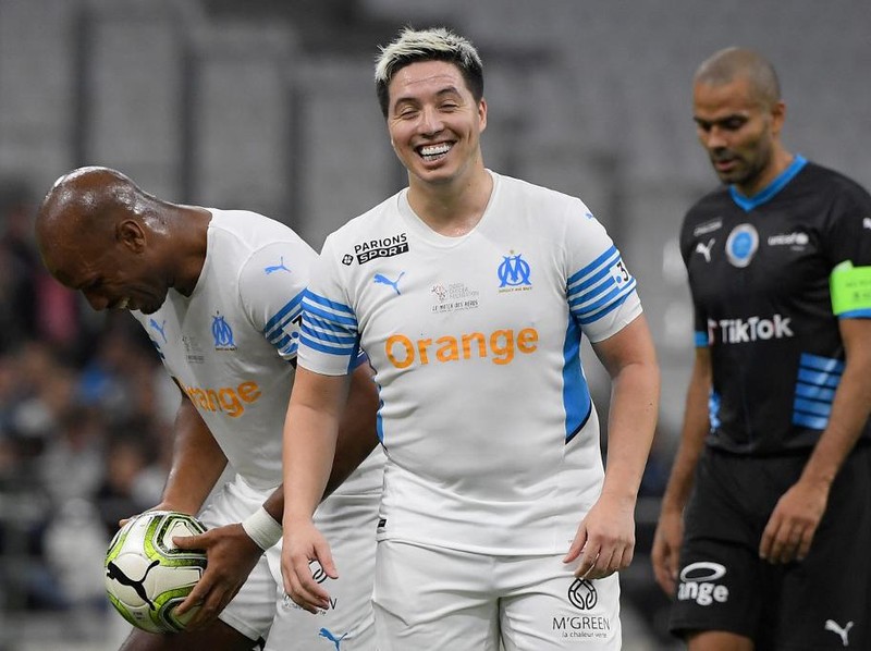 French former player Samir Nasri reacts during the charity 