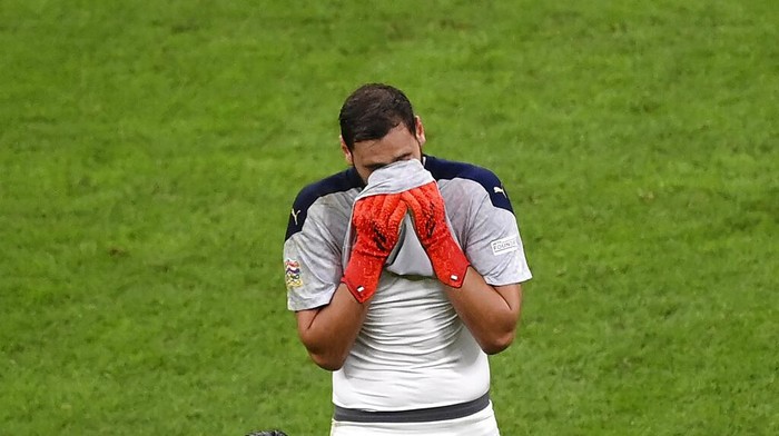 Italys goalkeeper Gianluigi Donnarumma reacts at the end of the UEFA Nations League semifinal soccer match between Italy and Spain at the San Siro stadium, in Milan, Italy, Wednesday, Oct. 6, 2021. Spain won the match 1-2. (Marco Bertorello/Pool via AP)