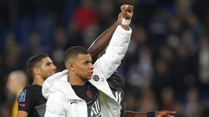 PSG's Kylian Mbappe reacts at the end of the French League One soccer match between Paris Saint-Germain and Angers at the Parc des Princes in Paris, France, Friday, Oct. 15, 2021. (AP Photo/Francois Mori)