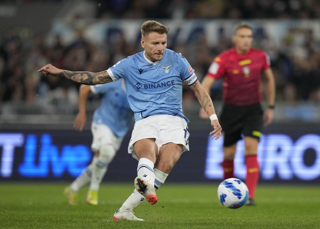 Lazio's Ciro Immobile scores his side's opening goal during the Serie A soccer match between Lazio and Inter Milan at Rome's Olympic stadium, Saturday, Oct. 16, 2021. (AP Photo/Alessandra Tarantino)