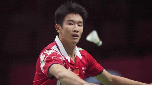 China's Li Shi Feng eyes the shuttlecock during a mens single match in the Thomas Cup mens team Badminton match between India and China, in Aarhus, Denmark, Thursday Oct. 14, 2021. (Claus Fisker/Ritzau Scanpix via AP)