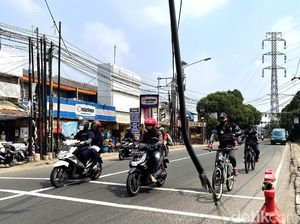 Bahaya, Kabel Dibiarkan Menjuntai di Depok