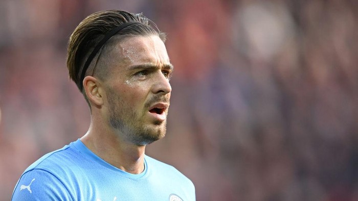 LIVERPOOL, ENGLAND - OCTOBER 03: Jack Grealish of Manchester City looks on during the Premier League match between Liverpool and Manchester City at Anfield on October 03, 2021 in Liverpool, England. (Photo by Michael Regan/Getty Images)