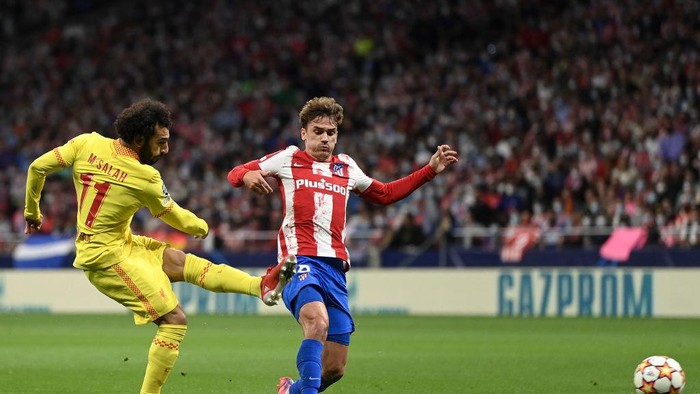 MADRID, SPAIN - OCTOBER 19: Mohamed Salah of Liverpool scores their sides third goal from the penalty spot during the UEFA Champions League group B match between Atletico Madrid and Liverpool FC at Wanda Metropolitano on October 19, 2021 in Madrid, Spain. (Photo by David Ramos/Getty Images)