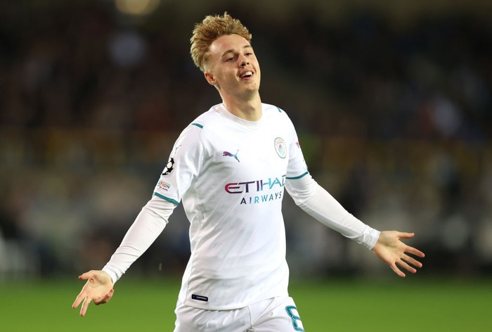 BRUGGE, BELGIUM - OCTOBER 19: Cole Palmer of Manchester City celebrates after scoring their sides fourth goal during the UEFA Champions League group A match between Club Brugge KV and Manchester City at Jan Breydel Stadium on October 19, 2021 in Brugge, Belgium. (Photo by Julian Finney/Getty Images)