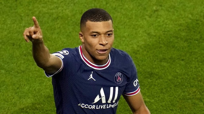 PSGs Kylian Mbappe celebrates after scoring his sides first goal during their Champions League soccer match between Paris Saint Germain and RB Leipzig at the Parc des Princes stadium in Paris, Tuesday, Oct. 19, 2021. (AP Photo/Christophe Ena)