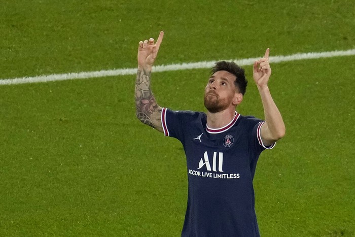 PSGs Lionel Messi celebrates after scoring his sides third goal during his Champions League soccer match between Paris Saint Germain and RB Leipzig at the Parc des Princes stadium in Paris, Tuesday, Oct. 19, 2021. (AP Photo/Christophe Ena)