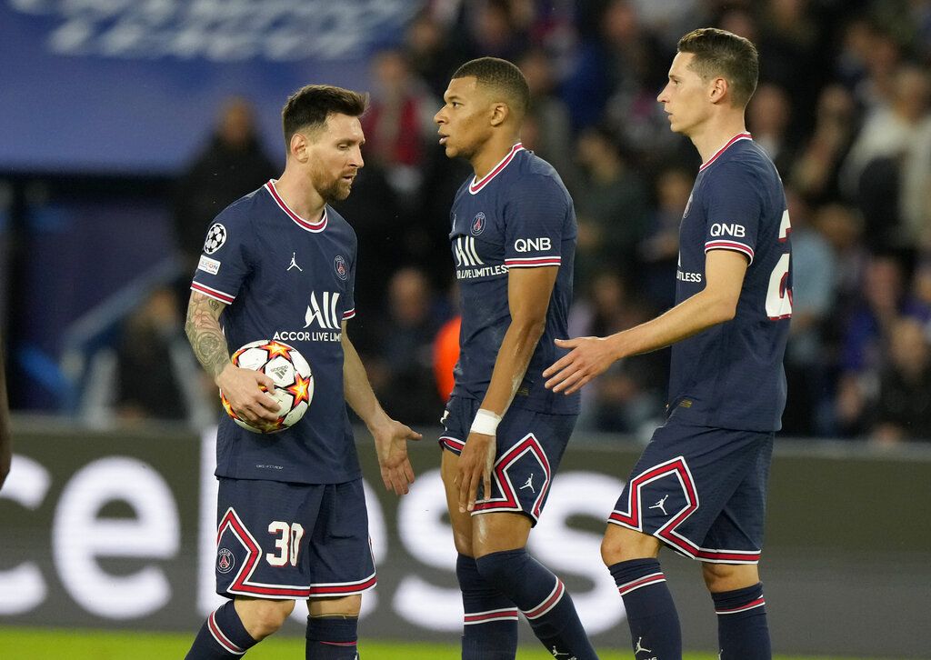 PSG's Lionel Messi, right, celebrates with his teammate Kylian Mbappe after scoring his side's third goal during his Champions League soccer match between Paris Saint Germain and RB Leipzig at the Parc des Princes stadium in Paris, Tuesday, Oct. 19, 2021. (AP Photo/Christophe Ena)