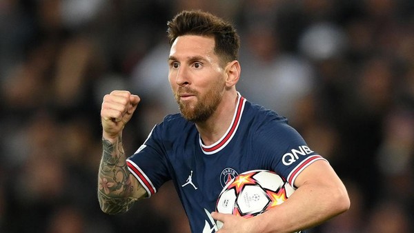 Lionel Messi PARIS, FRANCE - OCTOBER 19: Lionel Messi of Paris Saint-Germain celebrates after scoring their sides second goal during the UEFA Champions League group A match between Paris Saint-Germain and RB Leipzig at Parc des Princes on October 19, 2021 in Paris, France. (Photo by Matthias Hangst/Getty Images)