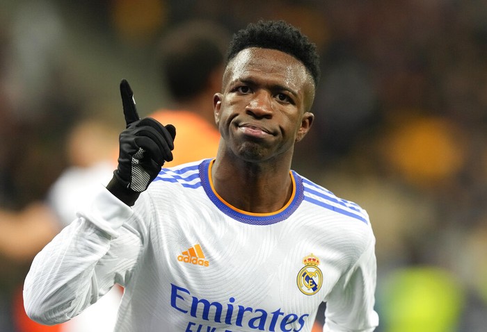 Real Madrids Vinicius Junior celebrates after scoring his sides third goal during the Champions League group D soccer match between Shakhtar Donetsk and Real Madrid at the Olympiyskiy stadium in Kyiv, Ukraine, Tuesday, Oct. 19, 2021. (AP Photo/Efrem Lukatsky)