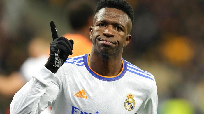 Real Madrids Vinicius Junior celebrates after scoring his sides third goal during the Champions League group D soccer match between Shakhtar Donetsk and Real Madrid at the Olympiyskiy stadium in Kyiv, Ukraine, Tuesday, Oct. 19, 2021. (AP Photo/Efrem Lukatsky)