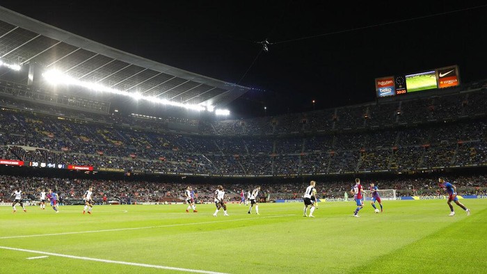Barcelonas Gerard Pique, second from right, celebrates with his teammates after scoring his sides first goal during a Champions League group E soccer match between F.C. Barcelona and Dinamo Kyiv at Camp Nou stadium in Barcelona, Spain, Wednesday, Oct. 20, 2021. (AP Photo/Joan Monfort)