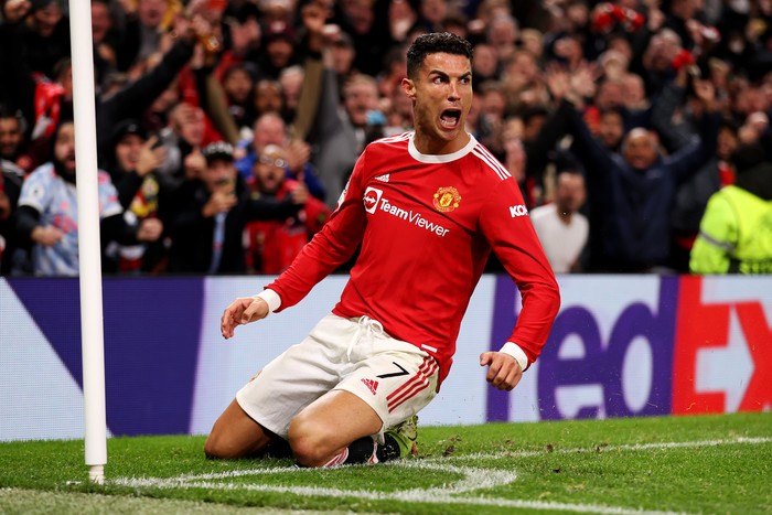 MANCHESTER, ENGLAND - OCTOBER 20: Cristiano Ronaldo of Manchester United celebrates after scoring their sides third goal  during the UEFA Champions League group F match between Manchester United and Atalanta at Old Trafford on October 20, 2021 in Manchester, England. (Photo by Naomi Baker/Getty Images)